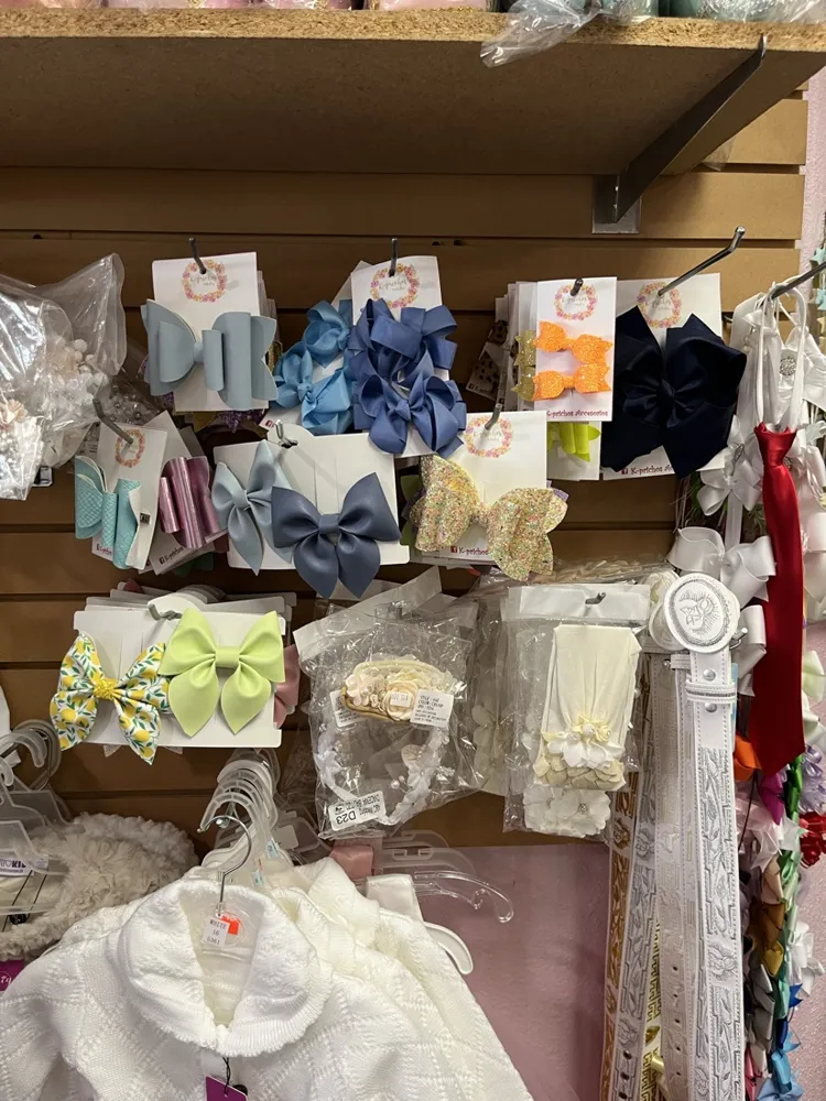 Hair bows and accessories on a wall display