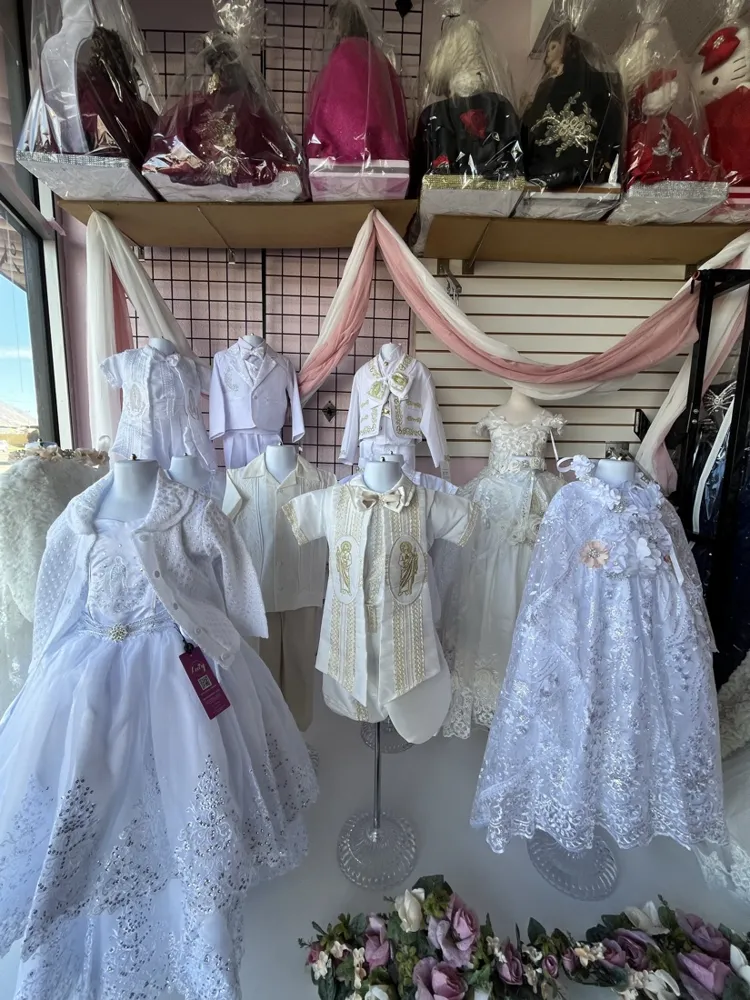 Baptism and first communion outfits on mannequins