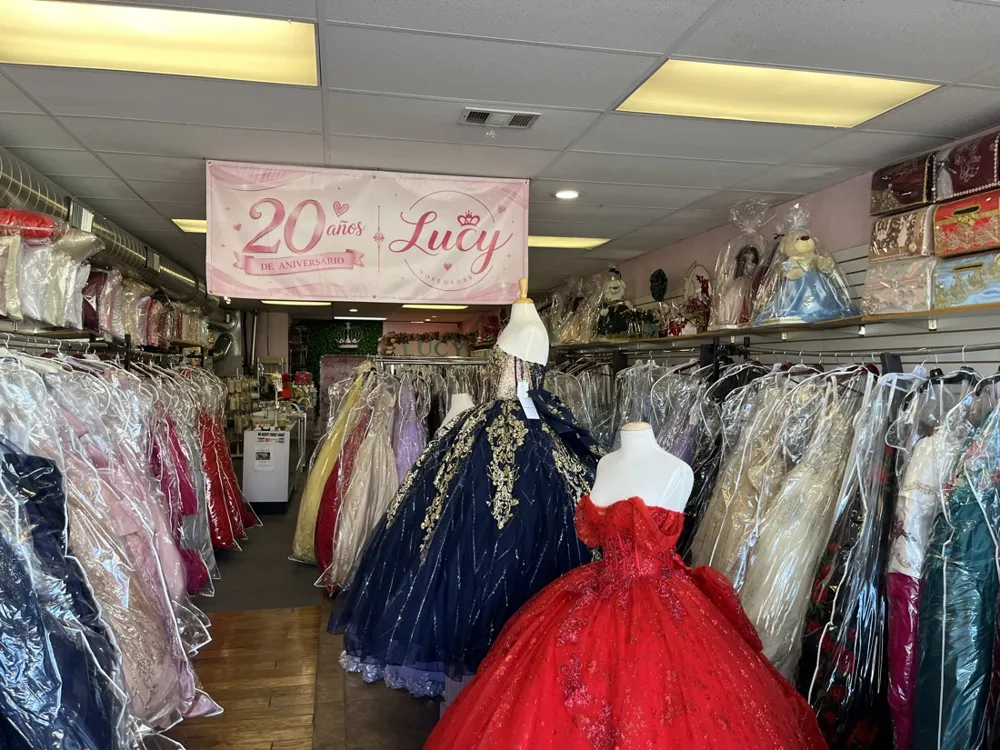 Racks of quinceañera ball gowns inside Novedades Lucy